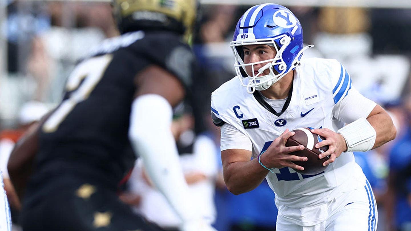 Bear Bachmeier #47 runs with the ball during a BYU Cougars game against UCF.