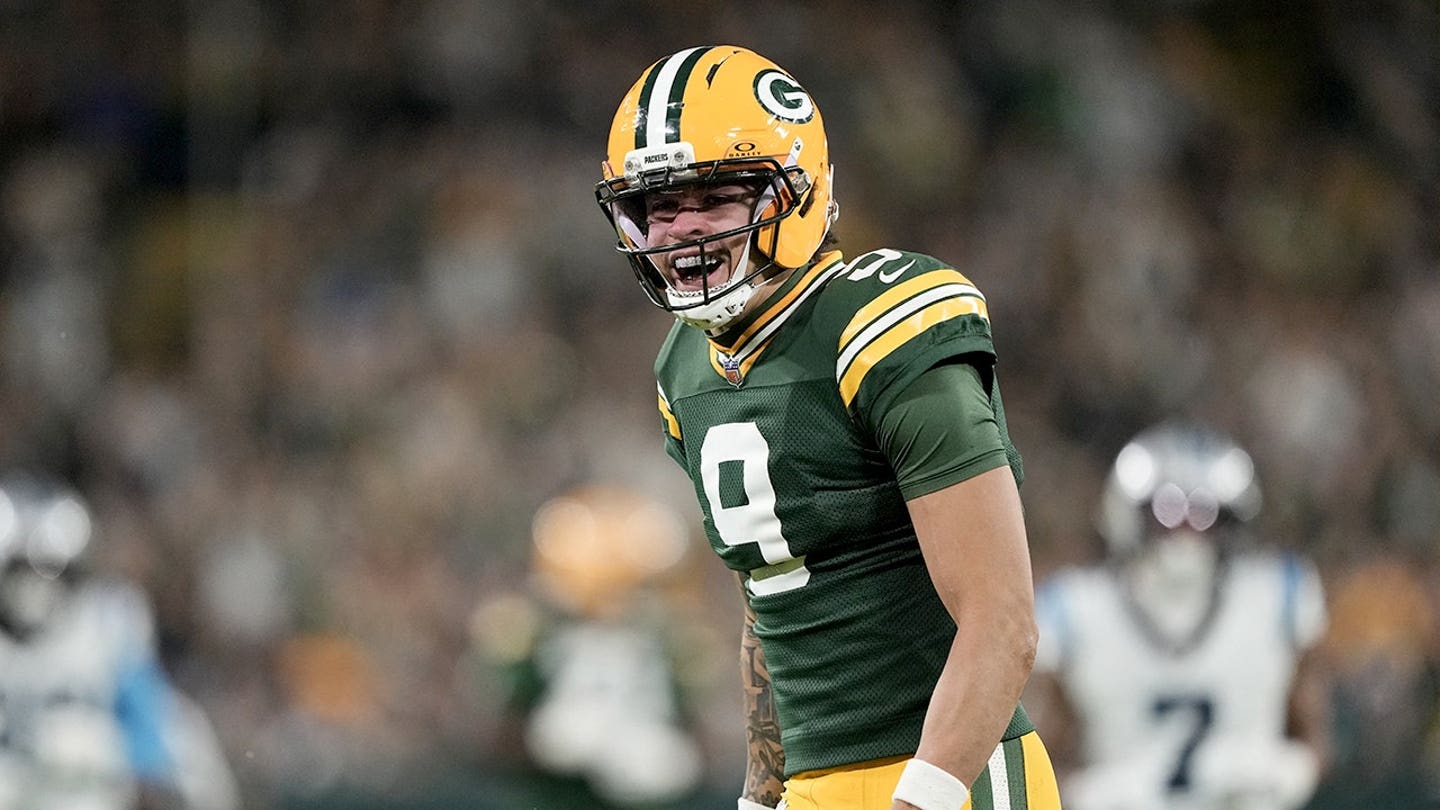 Christian Watson reacts during the game at Lambeau Field.