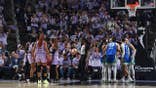 Golden State Valkyries and Dallas Wings huddle during a WNBA playoff game