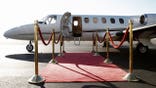 A private jet waiting for passengers to board.