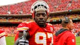 Allen Bailey gives thumbs up to Dustin Colquitt during Kansas City Chiefs game.