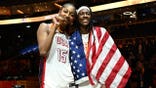 Angel Reese and Rhyne Howard of USA Basketball pose for a photo after the game in Berlin.