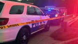 Police respond after a 12-year-old girl was killed and three adults were wounded after gunfire erupted near a youth football game at Leon Day Park in Baltimore