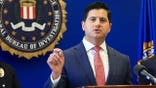 Bill Essayli speaks at FBI offices in Los Angeles during a law enforcement announcement.
