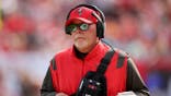Bruce Arians looks on during the first quarter of an NFC Wild Card playoff game.
