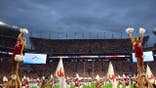 Bryant-Denny Stadium interior during national anthem before Alabama vs. Georgia football game.