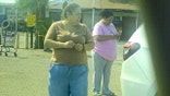 Calderon walking outside near car