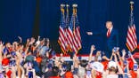 Donald Trump points at Ken Paxton's campaign event in San Antonio, Texas