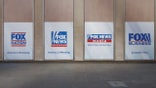 Signs at the side entrance to the FOX News Headquarters