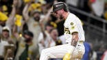 Jackson Merrill celebrates after scoring a run during the third inning at Petco Park.