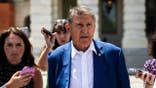 Sen. Joe Manchin walks away from the U.S. Capitol in Washington, D.C.