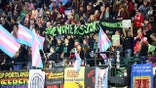 Save Women’s Sports activists are surrounded by an agitated group of trans supporters after unfurling a large “Save Women’s Sports” banner and revealing XX-XY shirts at a Portland Thorns match Friday, Oct. 23, 2026.