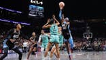 Rhyne Howard shoots over Rebekah Gardner during WNBA playoffs game at State Farm Arena.