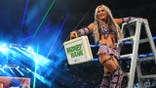 Tiffany Stratton celebrates after her win at Money in the Bank in New Orleans.