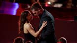 T.J. Watt shares a moment with Dani Rhodes as he receives the AP Defensive Player of the Year Award.