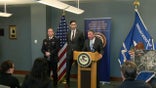 U.S. and Canadian law enforcement officials announce an arrest connected to the Tumbler Ridge school shooting at a Seattle news conference