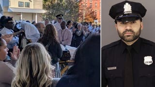 Shot 12 times in ambush that killed his partner, Philadelphia officer leaves hospital to cheers