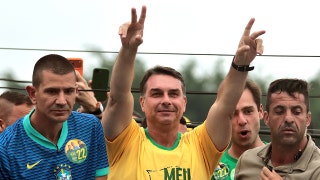 Bolsonaro wins first round of Brazilian presidential election, as Trump-backed candidates continue red wave