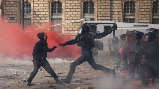 Violence erupts at France protests as Macron warns unrest is being exploited