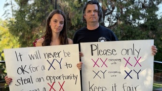 Dad banned from school grounds after protesting trans runner competing against his daughter