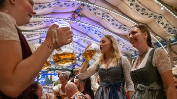 The ladies of Oktoberfest crush draft beers as fall heats up, Ryan Day's message to sick kids & a Strip fight