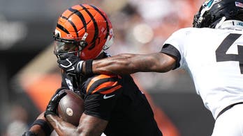 Bengals' Ja'Marr Chase suffers concussion after getting his facemask pulled and taking huge hit