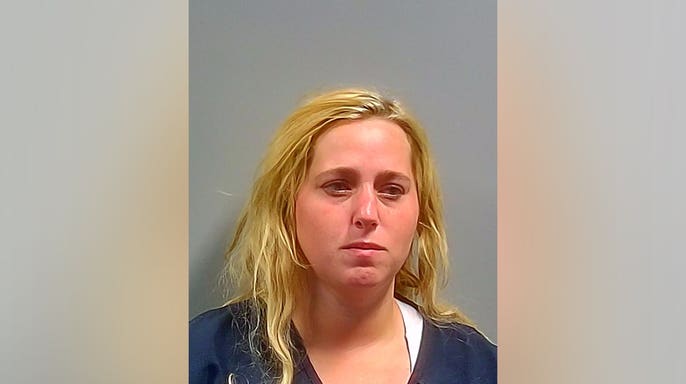 Amanda Carr is pictured following her arrest in Escambia County, Florida.