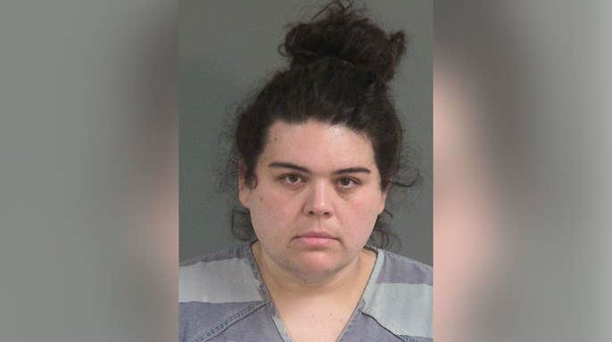 Justine Marie May in a booking photo