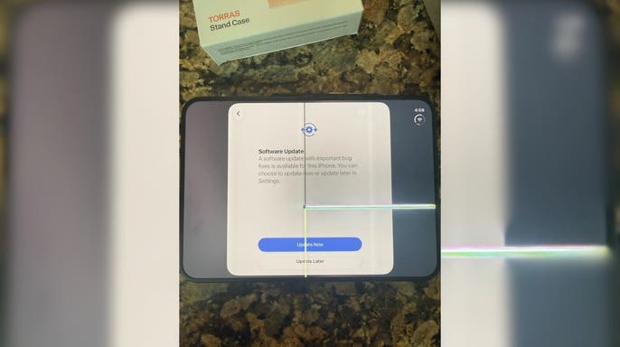 An iPhone Duo with a cracked screen