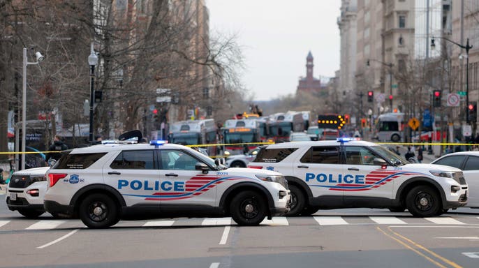 Members of the D.C. Metropolitan Police respond to reports of a bomb threat near One Franklin Square on March 13, 2026, in Washington, D.C.