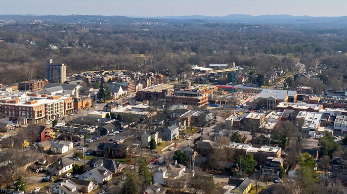 Aerial view of downtown Franklin, Tennessee, showing homes, businesses and surrounding trees