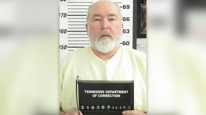 Gary Wayne Sutton pictured in a mugshot with a bald head and white beard