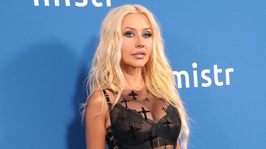 Christina Aguilera strips down in steamy bathtub snap with cheeky Halloween twist