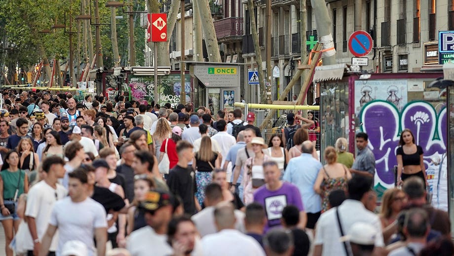 Furious crowds protest sky-high housing costs and mass tourism in major city