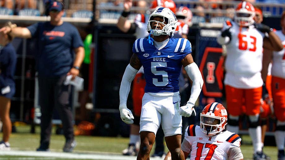 Duke football player apologizes to trainer after swatting her arm away during in