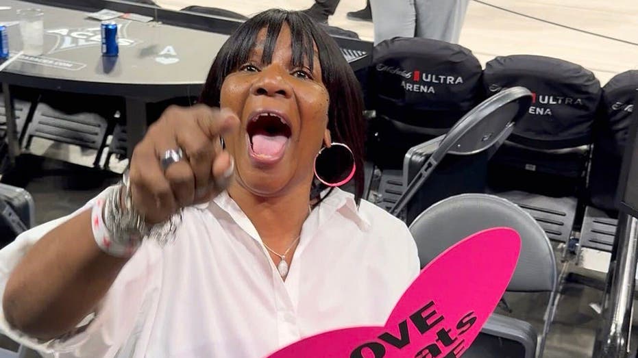 A'ja Wilson's mom freaks out when asked to explain her 'Love Beats Hate' sign after Game 3 win vs Fever