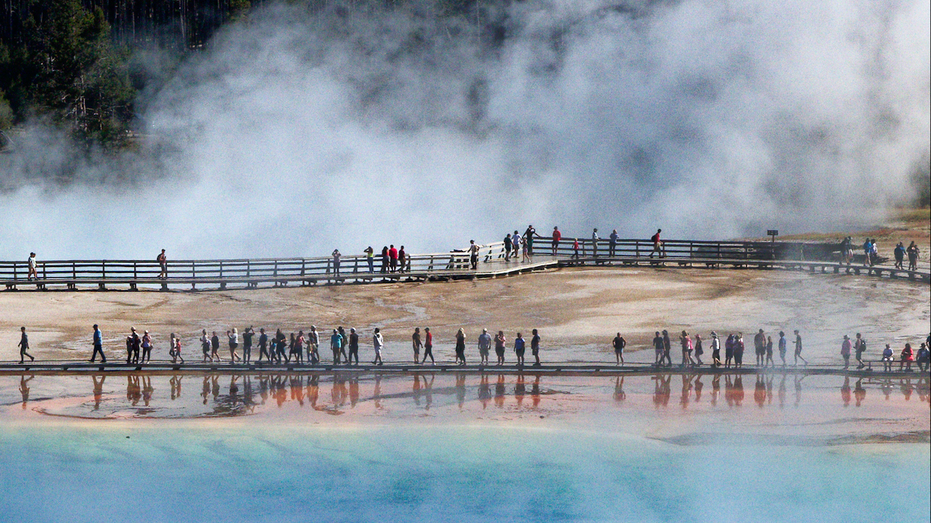 Reckless visitors are destroying Yellowstone's iconic thermal pools with trash