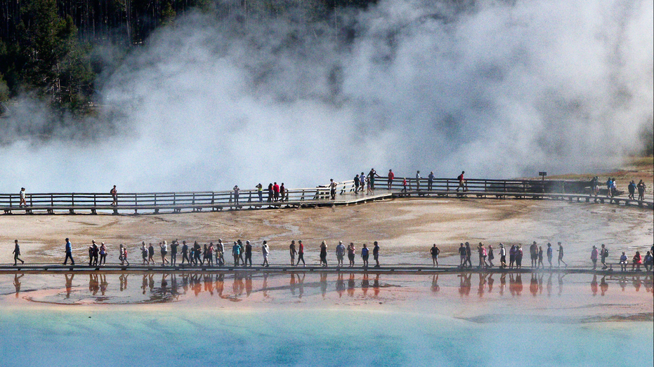 Reckless visitors are destroying Yellowstone's iconic thermal pools with trash