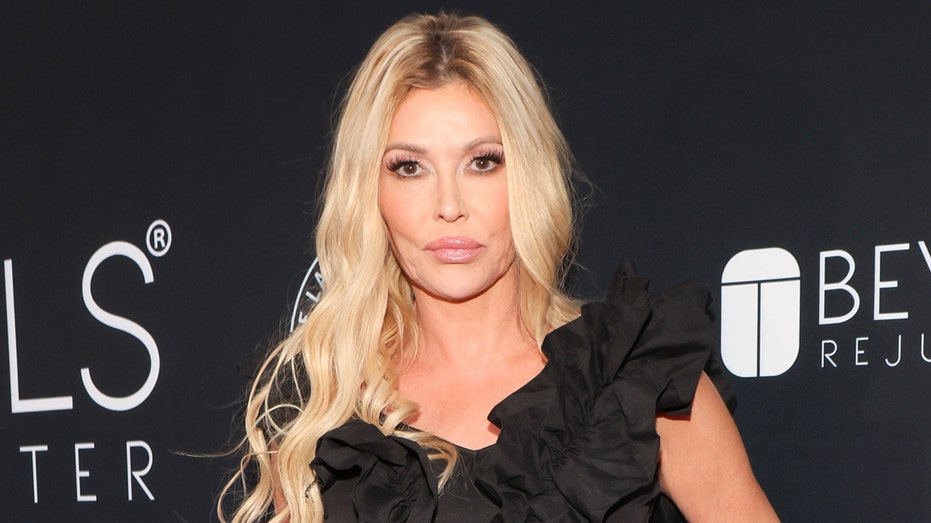 Brandi Glanville says doctors are 'taking my face off' in exploratory surgery after years of health issues