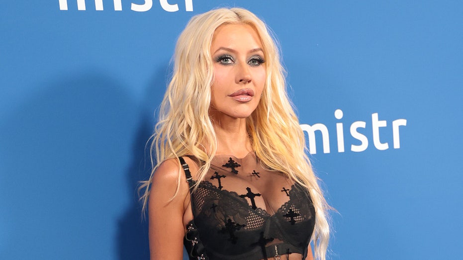 Christina Aguilera strips down in steamy bathtub snap with cheeky Halloween twist