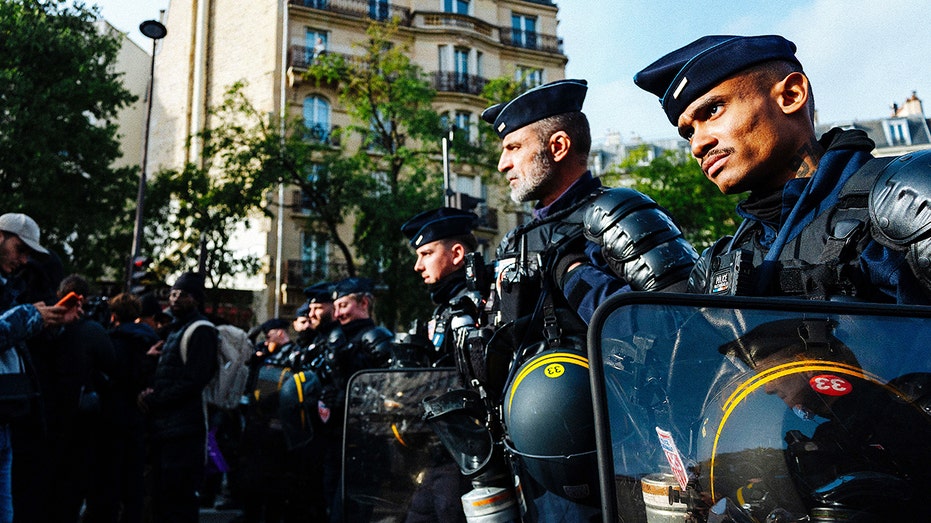 France on edge with 70,000 police deployed for unrest as authorities probe suspected terror attack near Paris