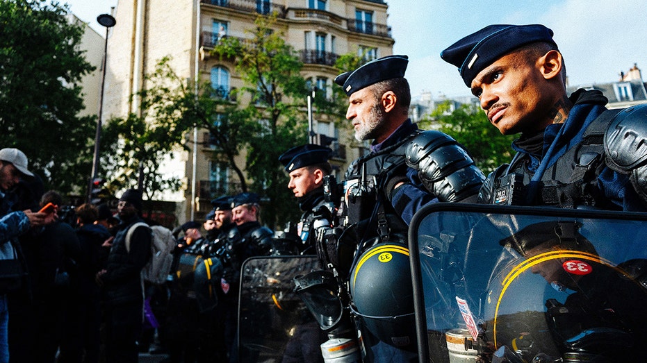 France on edge with 70,000 police deployed for unrest as authorities probe suspected terror attack near Paris