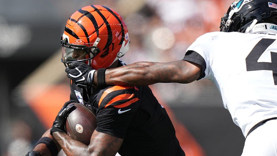 Bengals' Ja'Marr Chase suffers concussion after getting his facemask pulled and taking huge hit