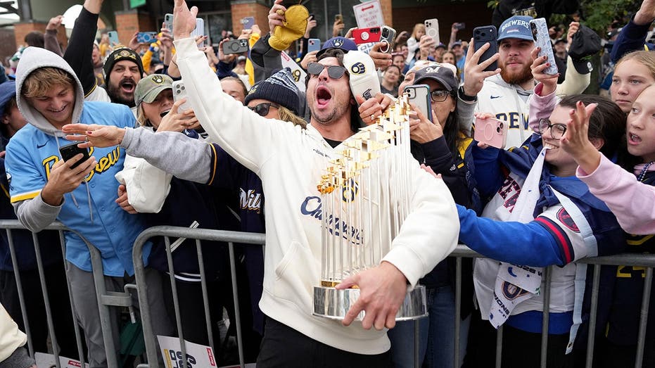 Brewers' World Series celebration gets rowdy as star makes outrageous beer promise, coach sings karoke