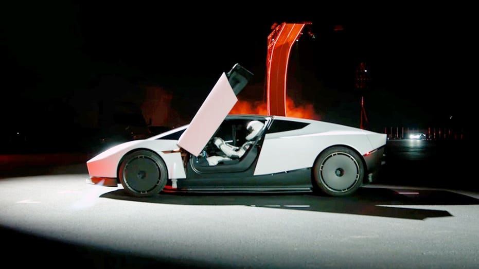Tesla Roadster flies, flips and hits 60 mph in a flash