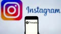 INDIA - 2024/02/12: In this photo illustration, the Threads logo is seen displayed on a mobile phone screen with Instagram logo in the background. (Photo Illustration by Idrees Abbas/SOPA Images/LightRocket via Getty Images) - Fox News