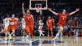 LOS ANGELES, CALIFORNIA - MARCH 28: Chase Hunter #1, Ian Schieffelin #4 and Joseph Girard III #11 of the Clemson Tigers celebrates after defeating the Arizona Wildcats during the second half in the Sweet 16 round of the NCAA Men's Basketball Tournament at Crypto.com Arena on March 28, 2024 in Los Angeles, California. The Clemson Tigers won, 77-72. (Photo by Harry How/Getty Images)