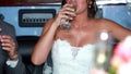 bride drinking champaign.