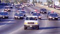 California Highway Patrol chase Al Cowlings, driving, and O.J. Simpson, hiding in rear of white Bronco on the 91 Freeway, just West of the I5 freeway. The chase ended in Simpson's arrest at his Brentwood home. (Photo by Allen J. Schaben/Los Angeles Times via Getty Images)