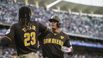 Dodgers Fan Pulls Clever 'Switcheroo' After Catching Manny Machado HR